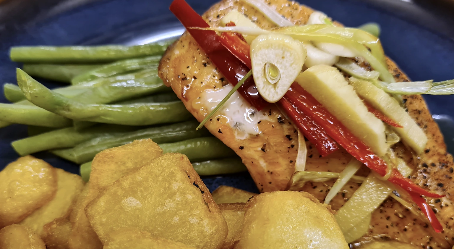 Fish and chips with salad garnish