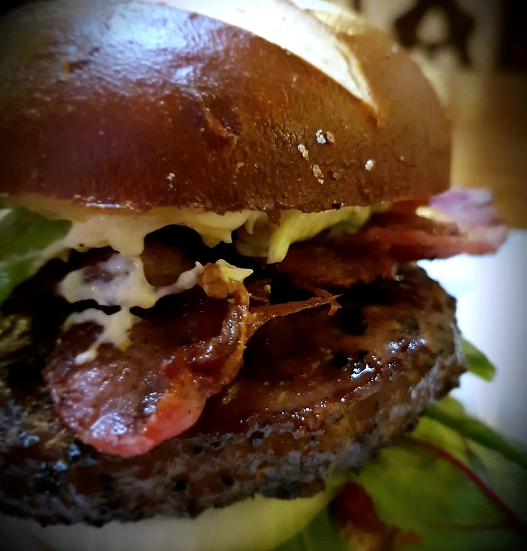 Black Swan burger with bacon and fries